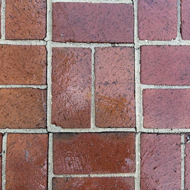 Restored red brick pavers after pressure washing in Fairfax County VA